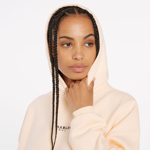 ELY-AS Hoodie Unisex mit Backprint cream
