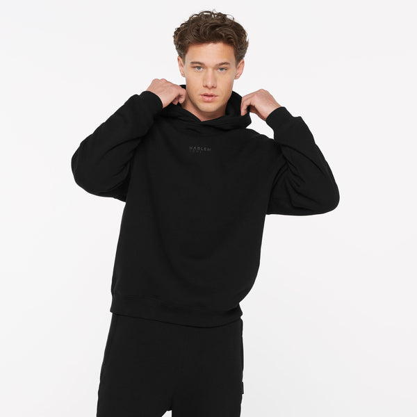 ELY-AS Hoodie Unisex mit Backprint black