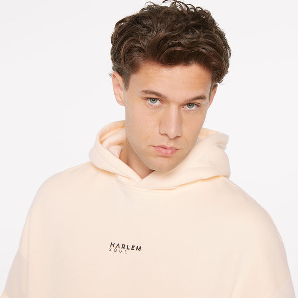 ELY-AS Hoodie Unisex mit Backprint cream