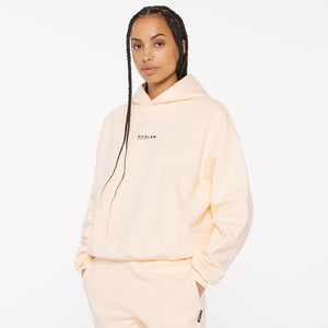 ELY-AS Hoodie Unisex mit Backprint cream