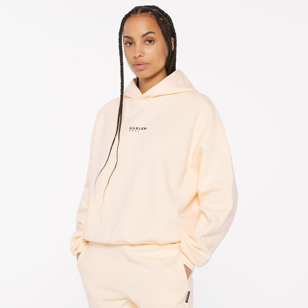 ELY-AS Hoodie Unisex mit Backprint cream