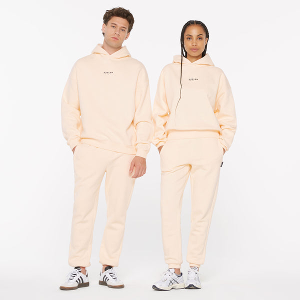 ELY-AS Hoodie Unisex mit Backprint cream